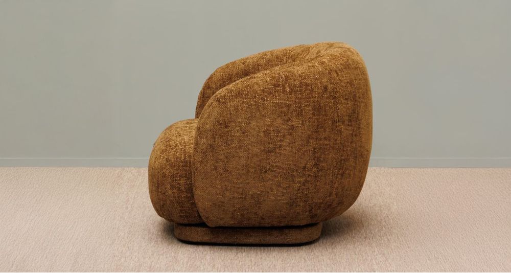 Fauteuil Moeraki rotatif en tissu, confort design enveloppant